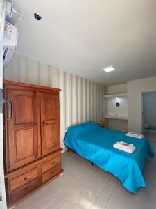 Ένα ή περισσότερα κρεβάτια σε δωμάτιο στο Hotel en Ruta
