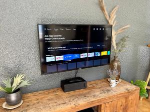 TV a/nebo společenská místnost v ubytování La Cascade, Venosc - Les 2 Alpes
