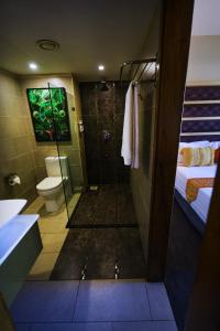 Koupelna v ubytování Arcadia Suites - Kampala