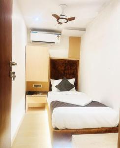 Postel nebo postele na pokoji v ubytování Hotel Winton
