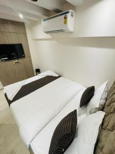 Postel nebo postele na pokoji v ubytování Hotel Winton