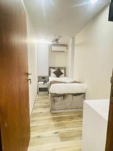 Postel nebo postele na pokoji v ubytování Hotel Winton