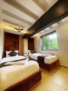 Postel nebo postele na pokoji v ubytování Hotel Winton