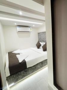 Postel nebo postele na pokoji v ubytování Hotel Winton