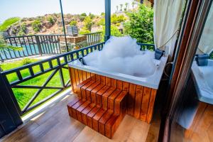 A balcony or terrace at Porto Amore Club Hotel