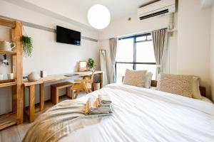 New! Japandi 203 1BR in Prime Location-1 min to Station客房内的一张或多张床位