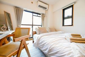 New! Japandi 203 1BR in Prime Location-1 min to Station客房内的一张或多张床位