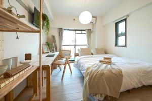 New! Japandi 203 1BR in Prime Location-1 min to Station客房内的一张或多张床位