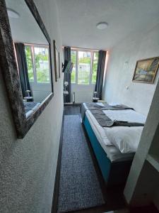 Letto o letti in una camera di Bed and Breakfast M Jasmin