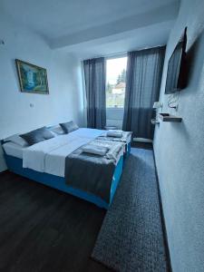 Postel nebo postele na pokoji v ubytování Bed and Breakfast M Jasmin