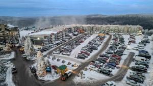 an aerial view of a parking lot at a resort at ML240 Mountain Views Next to slopes Gated Parking in Snowshoe +3 photos