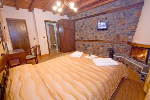 Katil atau katil-katil dalam bilik di Guesthouse Toitos