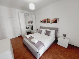 Letto o letti in una camera di Domus Drea