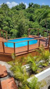 Bazen u objektu La Canopée - Appartement F2 avec piscine - vue mer ili u blizini