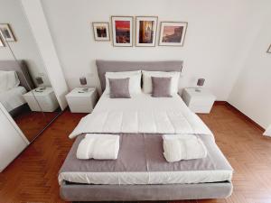 Letto o letti in una camera di Domus Drea