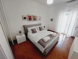 Letto o letti in una camera di Domus Drea