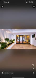 a television screen with a picture of a house at Location appartement luxueux Tunis in Tunis