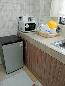 Kuchyň nebo kuchyňský kout v ubytování Reyna Apartments