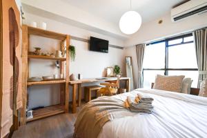 Letto o letti in una camera di New! Japandi 3 1BR in Prime Location-1 min to STN