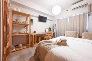 Letto o letti in una camera di New! Japandi 3 1BR in Prime Location-1 min to STN