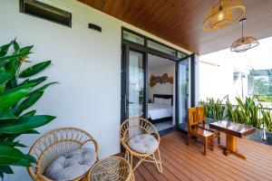 Posezení v ubytování Beach Palm Villa Hoi An