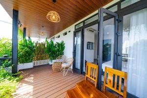 Balkón nebo terasa v ubytování Beach Palm Villa Hoi An