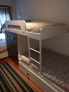Postel nebo postele na pokoji v ubytování Vivienda Turística La Moleta