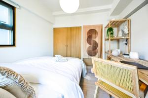 New! Japandi 4 1BR in Prime Location-1 min to STN客房内的一张或多张床位