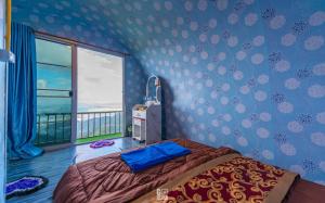 Postel nebo postele na pokoji v ubytování กลิ่นไอหมอก โฮมสเตย์ เชียงใหม่ + 14 fotografií