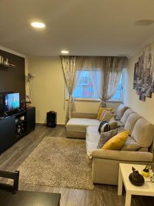 Μια τηλεόραση ή/και κέντρο ψυχαγωγίας στο Quarto suite em apartamento compartilhado