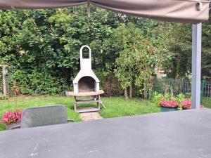 Ein Garten an der Unterkunft Label Semois Gite rural 3 épis