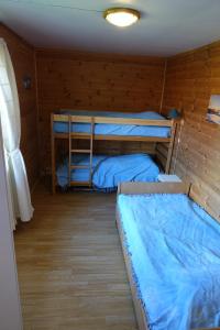 Postel nebo postele na pokoji v ubytování Guesthouse Hamran