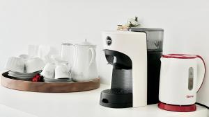 Příslušenství pro přípravu čaje a kávy v ubytování Centro Solferino Rooms