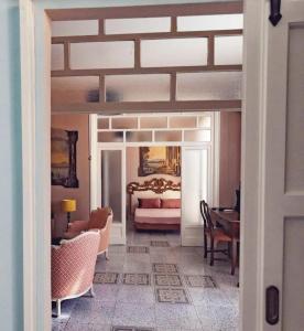 Postel nebo postele na pokoji v ubytování Luxury Suite Vitruvio 55