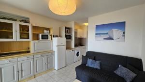 Kuchyň nebo kuchyňský kout v ubytování Première ligne mer ! T2 4 personnes