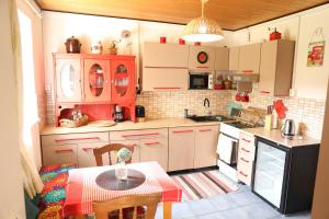 Kuchyňa alebo kuchynka v ubytovaní TUTTO House&Home