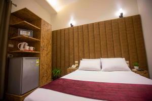 Postel nebo postele na pokoji v ubytování B&G Vlncia Hotel Dontown
