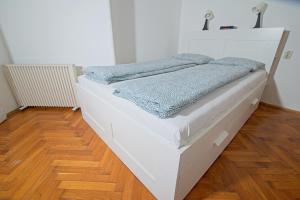 Postel nebo postele na pokoji v ubytování Apartment SVEN Opatija