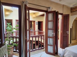 Postel nebo postele na pokoji v ubytování Riad Mumtaz Marrakech
