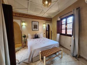 Postel nebo postele na pokoji v ubytování Riad Mumtaz Marrakech