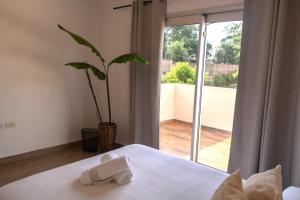 Voodi või voodid majutusasutuse Habitaciones con amplia terraza a minutos del centro toas