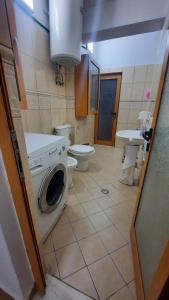 Koupelna v ubytování Center apartament