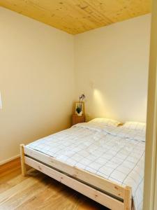Ένα ή περισσότερα κρεβάτια σε δωμάτιο στο Apartment Kovacic - Lake Bled