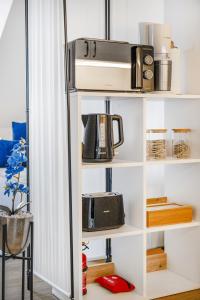 Tetera y cafetera en Exquisite Superior Suite 80m2 mit 2 Schlafzimmern & Badewanne - Messe Essen