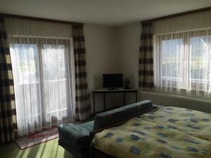 Postel nebo postele na pokoji v ubytování Landhaus Moises