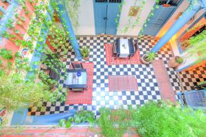 an overhead view of a house with a checkered floor at Les Matins Bleus in Essaouira