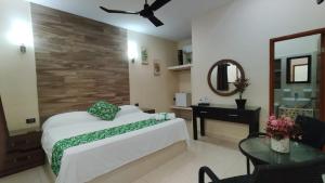 Katil atau katil-katil dalam bilik di Hotel San Miguel