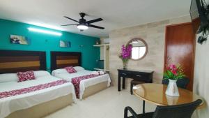 Katil atau katil-katil dalam bilik di Hotel San Miguel