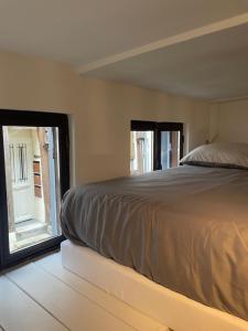 Postel nebo postele na pokoji v ubytování cosy one1h20 de Paris