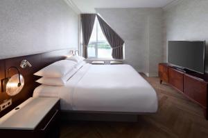 Voodi või voodid majutusasutuse Delta Hotels by Marriott Fredericton toas